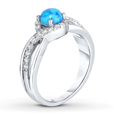 Το εργαστήριο δημιούργησε το μπλε Opal δαχτυλίδι άσπρο Topaz με το εξαιρετικό ασήμι 925